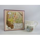 The world of beatrix potter Paths and Burrows game and a Peter Rabbit jug.