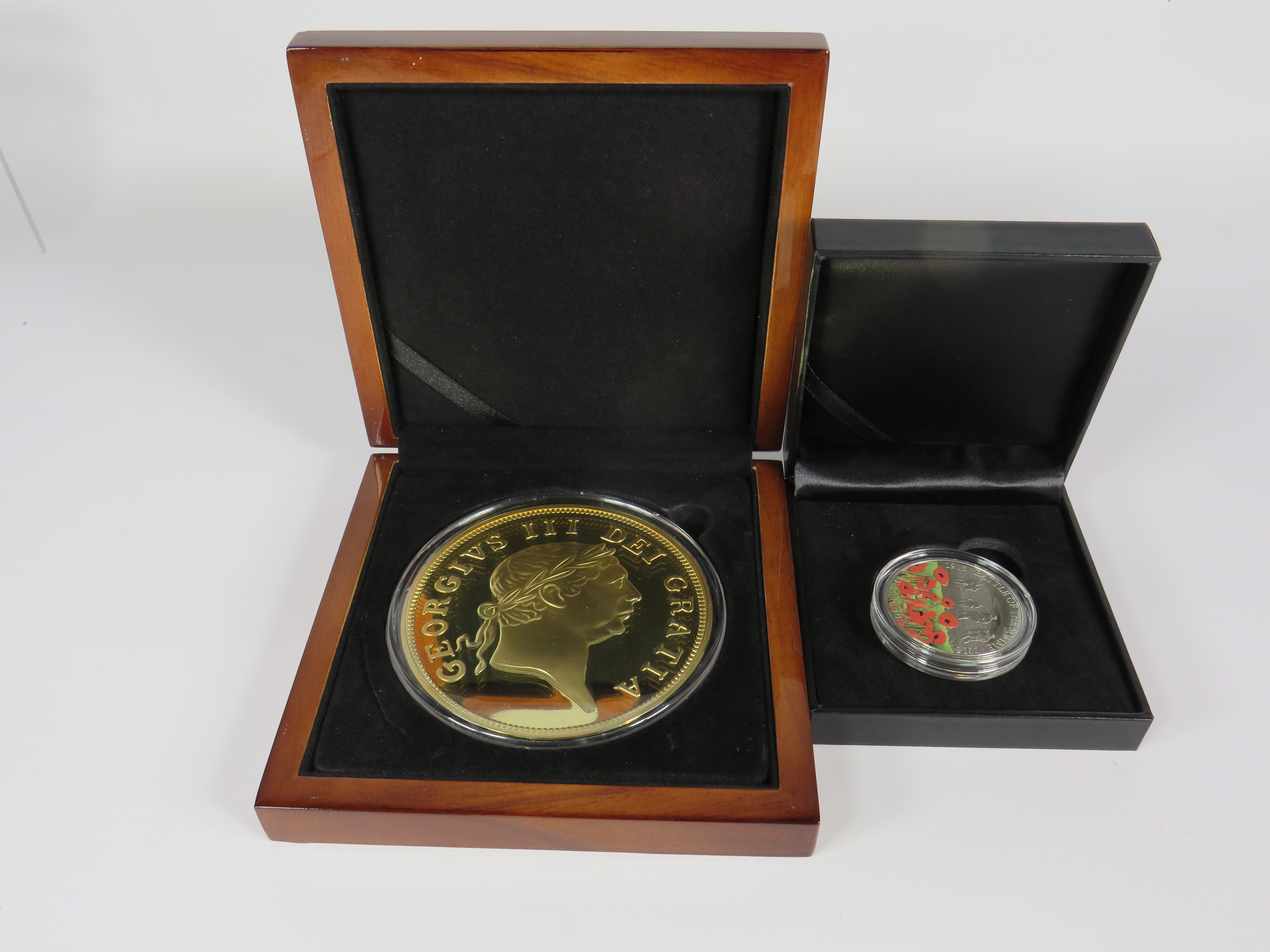 2016 Centenery proof Cupro Nickel £5 coin with box and papers together with a London Mint Jumbo