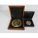 2016 Centenery proof Cupro Nickel £5 coin with box and papers together with a London Mint Jumbo