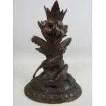 Vintage Black Forrest carved wooden candle stick decorated with birds and flowers. Approx 9" tall.