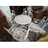Cast metal garden table with four matching chairs