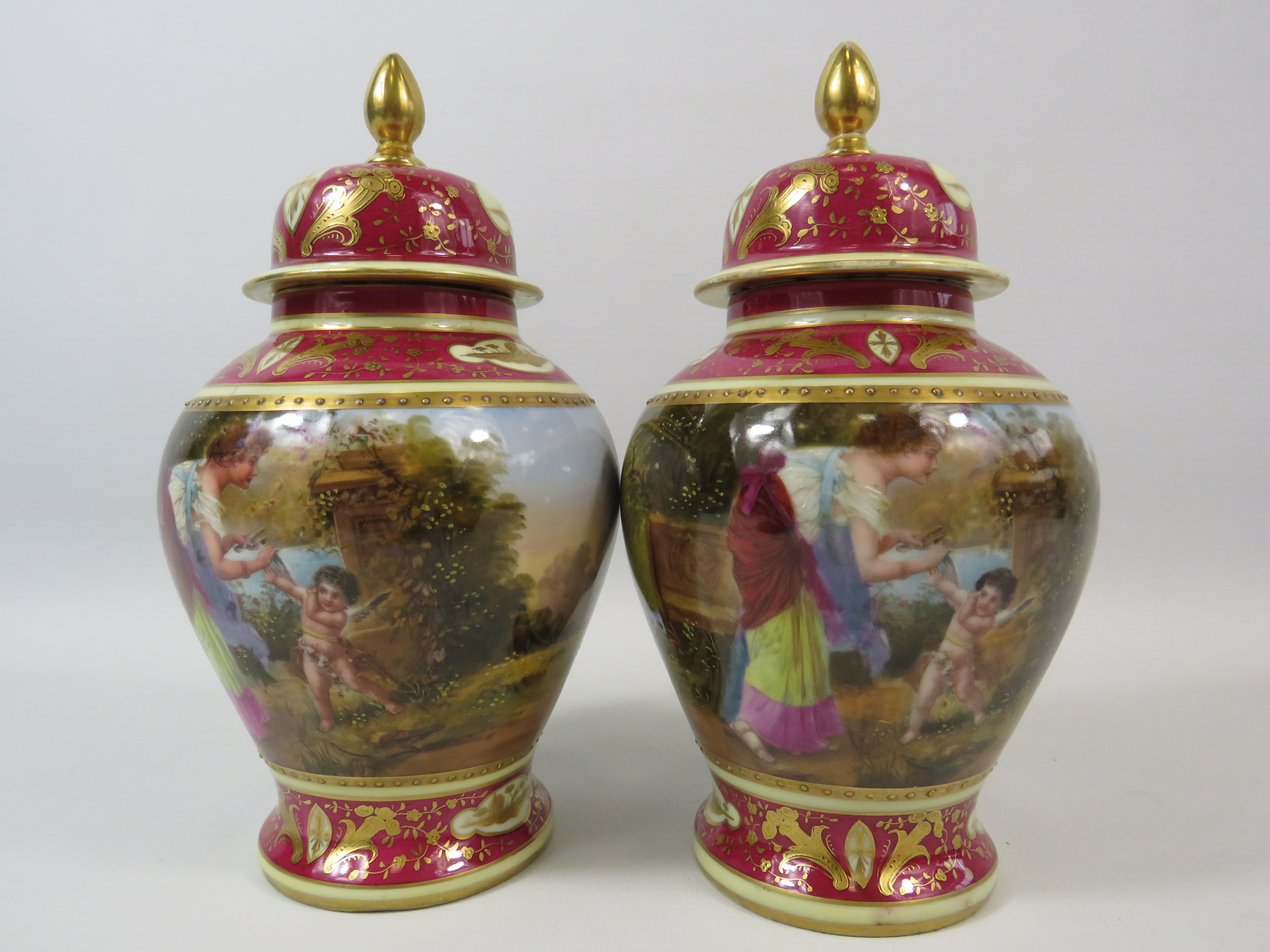 Pair of Vienna style lidded urn vases, both have had a repair/ damage to the lids. Approx 9" tall. - Image 5 of 6