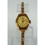 9ct gold Ladies cocktail watch. Swiss made. Non runner for spares or repairs. 9ct gold body and str