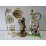 2 figural mantle clocks plus one other,
