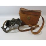Pair of 1930s Kershaw and son, bino prism binoculars with leather case.