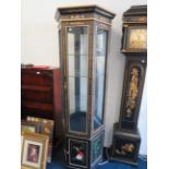 Chinoisere ebonised and laquered Hexagonal glass sided display cabinet with painted decorations to t