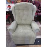 Comfortably Upholstered electrically operated rise, recline chair with twin motors in working order.
