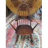 Mid 20th Century Ercol childs, or low seat Rocking chair. In very good condition with age related we