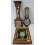 2 Oak cased vintage themometers and barometers and a wall clock.