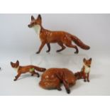 4 Beswick Fox Figurines.