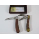 2 Wooden handle penknives.