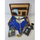 Masonic lot to include medals, sash, apron and books in a case.