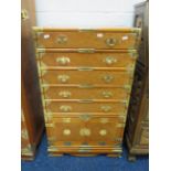 Reproduction Oriental style Campaign chest of drawers with exposed bright metal work. H:36 x W:21