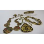 Selection of vintage Toledo damascene costume jewellery.