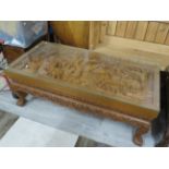 Beautifully carved Opium style table believed to have been brought from Thailand. Raised on carved