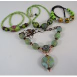 4 Artisan handmade glass and beaded necklaces some with 925 silver clasps.