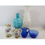 Art glass vases and 2 sets of glass cream jug and sugar bowl sets.