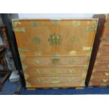 Reproduction Oriental style Campaign chest of drawers with exposed bright metal work. H:48 x W:42