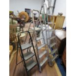 Three sets of metal step ladders the tallest being 74 inches tall. See photos. S2