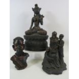 Mixed lot to include a Tibetan buddist, African bust and a african figural group.