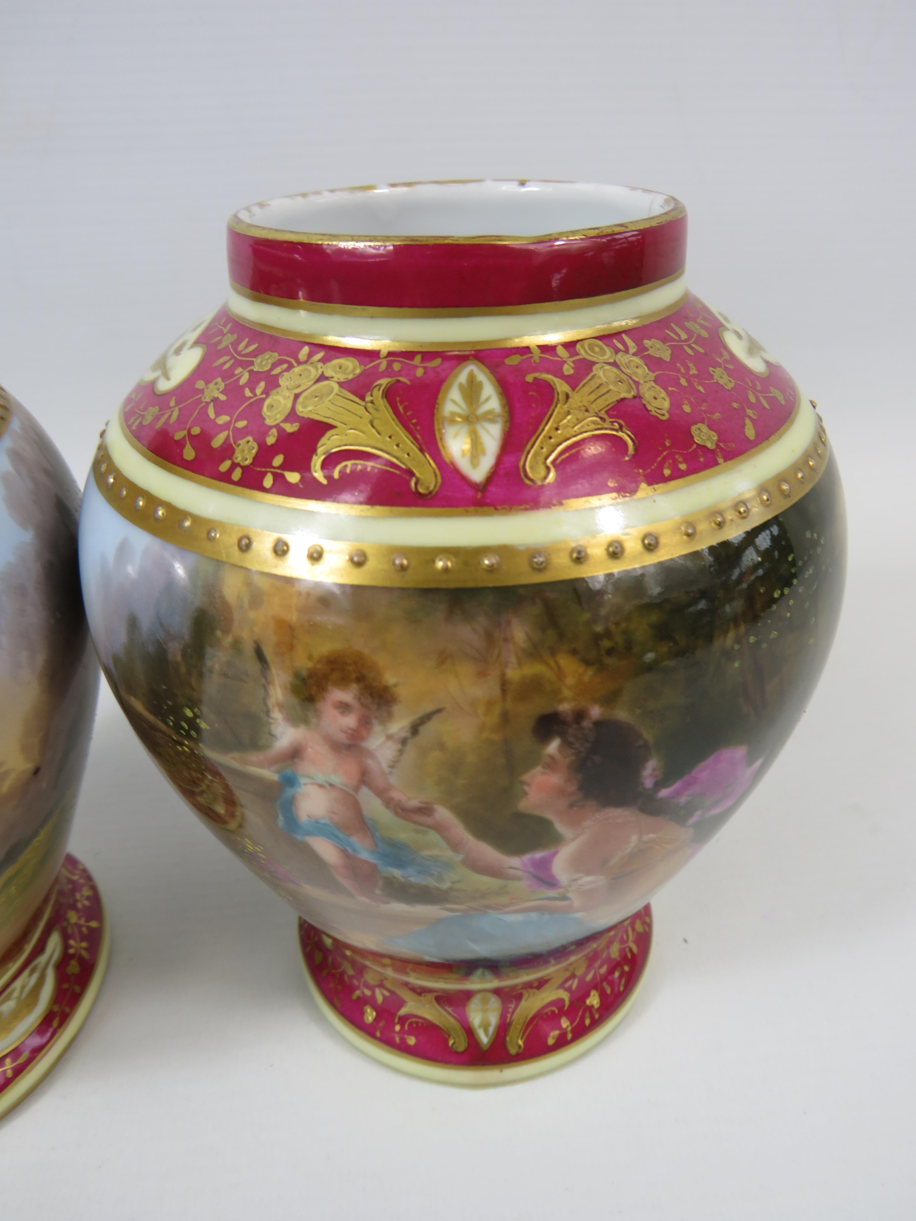 Pair of Vienna style lidded urn vases, both have had a repair/ damage to the lids. Approx 9" tall. - Image 4 of 6