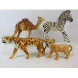 4 Beswick wild animals, Zebra, Camel, Lion and Tiger figurines all have had a repair.