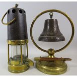 Vintage miners lamp from newcastle and a dinner bell.