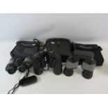 2 Pairs of Visionary 10 x 50 field of view Binoculars and a pair of Prinz 16 x 50 binoculars.