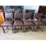 Four lovely antique oak leather covered parlour chairs. See photos.