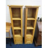 Pair of Blondewood display stands with handy drawer to each base. Each measures H:59 x W:16 x D:16