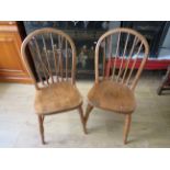 Two pretty wheelback chairs. See photos.