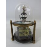 Novelty clock work fish tank clock in a glass dome in working condition.