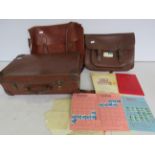 2 leather satchels and a small leather suitcase including a small amount of ephemera/ miltary
