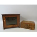 Small pipe rack cabinet and a vintage chinese puzzle box.