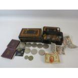 Two vintage cash boxes and a selection of various coins including a £5 God save the Queen.