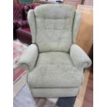 Comfortably Upholstered electrically operated rise, recline chair with twin motors in working order.