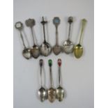 3 Sterling silver and enamel teaspoons plus 6 souvenir spoons.