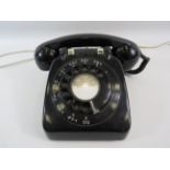 Vintage GPO black rotary telephone converted for everyday use.