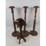 Three Early 20th Century wooden wigstands plus one other . Tallest 19 inches tall. . Ex museum stock