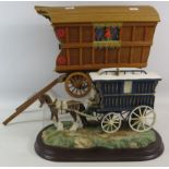 Wooden Gypsy bow top caravan 21" long and 10.5" tall plus a Leonardo sculpture of a Gypsy Family wth