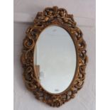 Gilt coloured plastic framed oval mirror 26 x 17 Inches. See photos . S2