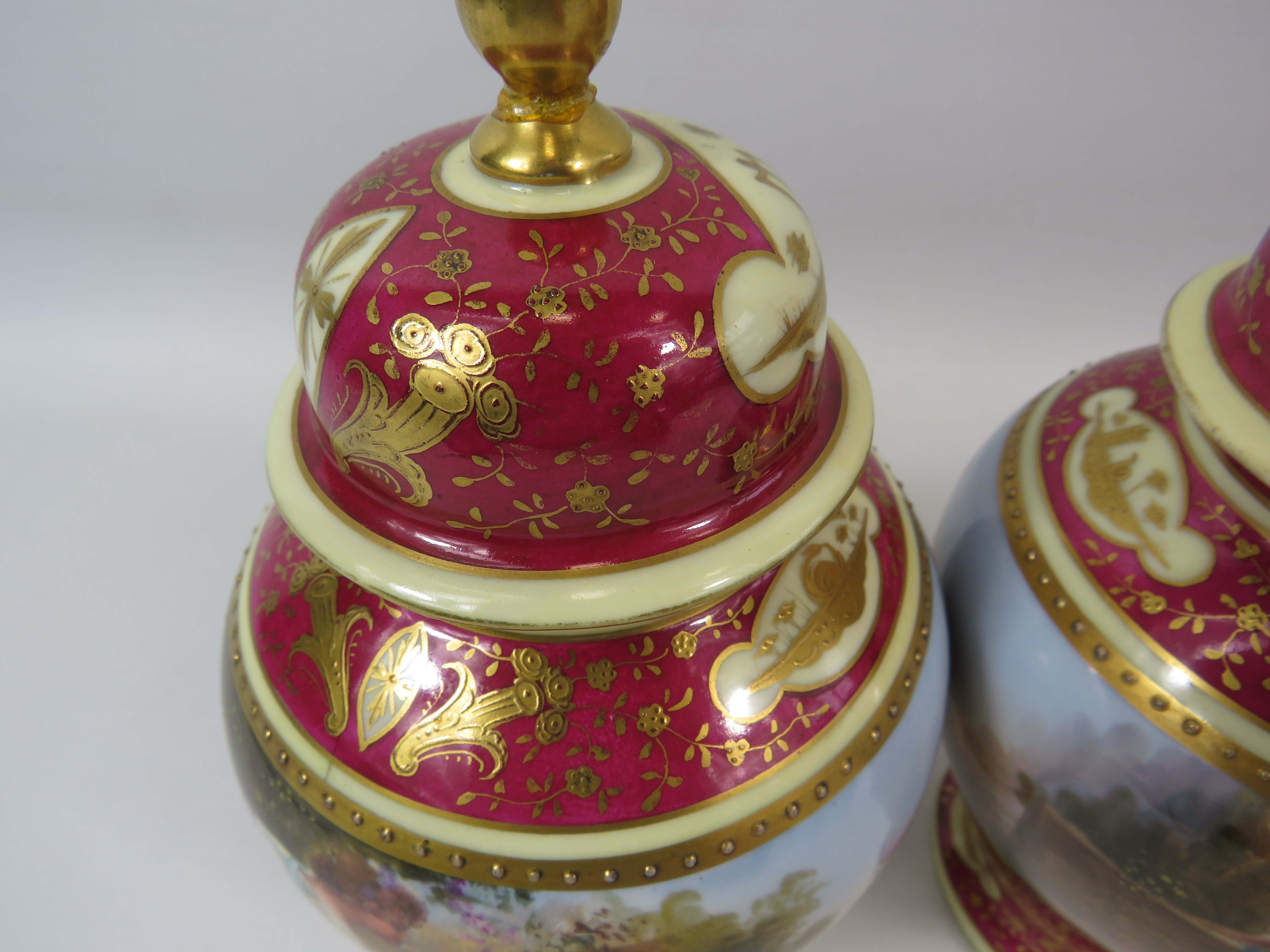Pair of Vienna style lidded urn vases, both have had a repair/ damage to the lids. Approx 9" tall. - Image 3 of 6