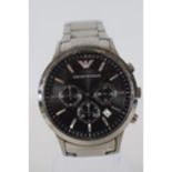 Emperio Armani quartz Chronograph. Will need battery to run. Heavy chrome strap. Watch Number AR2