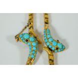 Victorian Era Double Snake head necklace. Each snake head has Turquoise Scales, Amethyst coloured ey