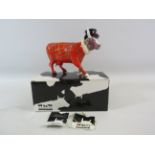 Cow Parade Beefeater cow figurine with box.