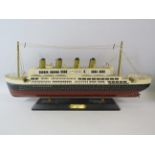 Model boat of the Titanic, 51cm long & 23cm tall.