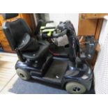 Invacare Mobility scooter with battery and charger. Runs well. See photos. S2