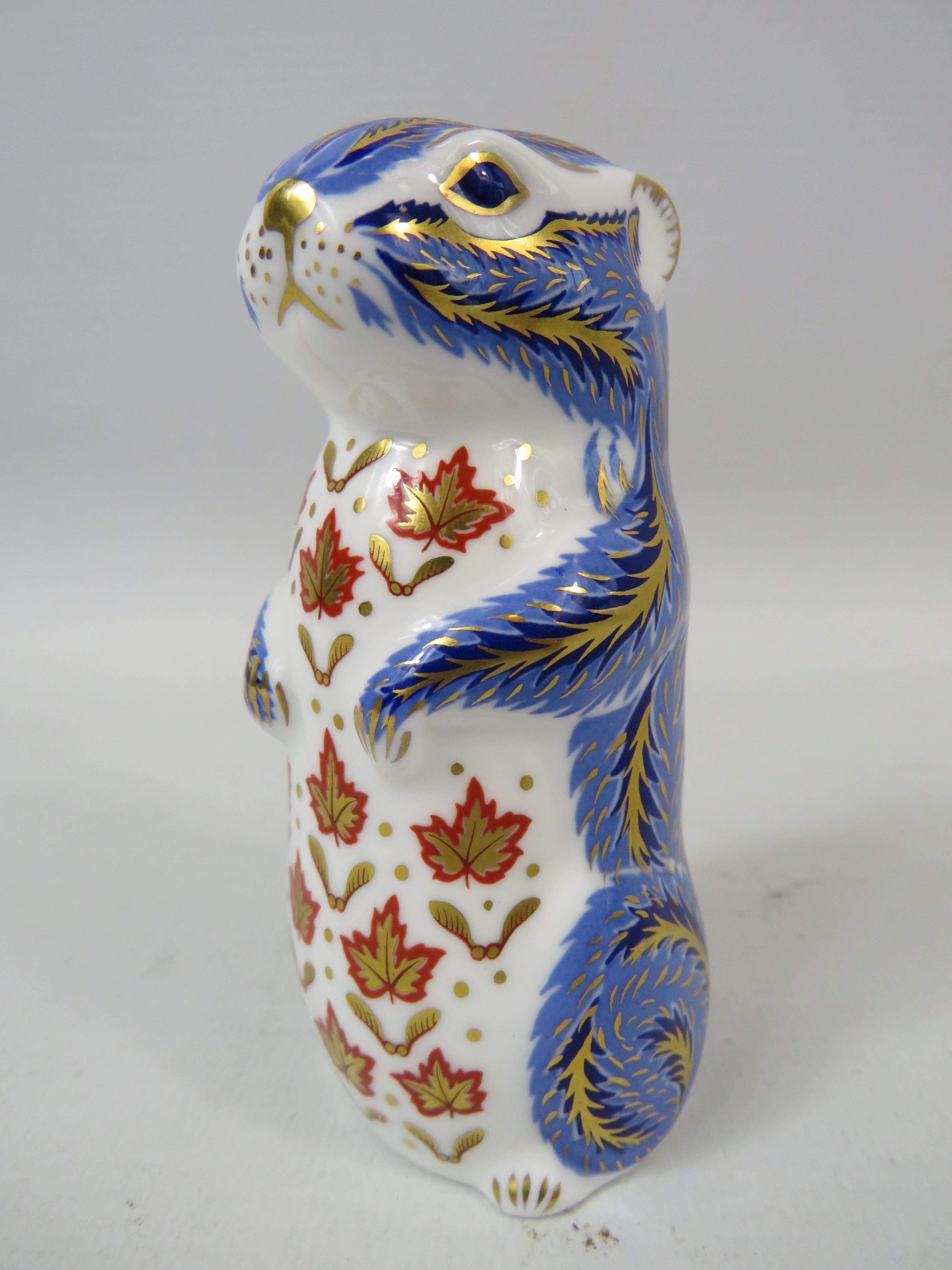 Royal Crown Derby paperweight Chipmonk with gold stopper.