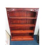 Darkwood Bookshelf with attractive decoration to the top corners. H:48 x W:36 x D:11 Inches. See ph