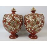 Pair of Antique oriental lidded vases, approx 10.5" tall.